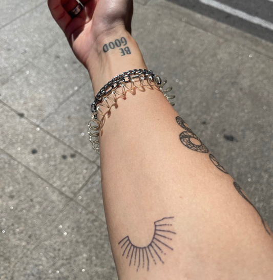 Temporary tattoo sun