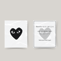 Temporary heart tattoo with eyes